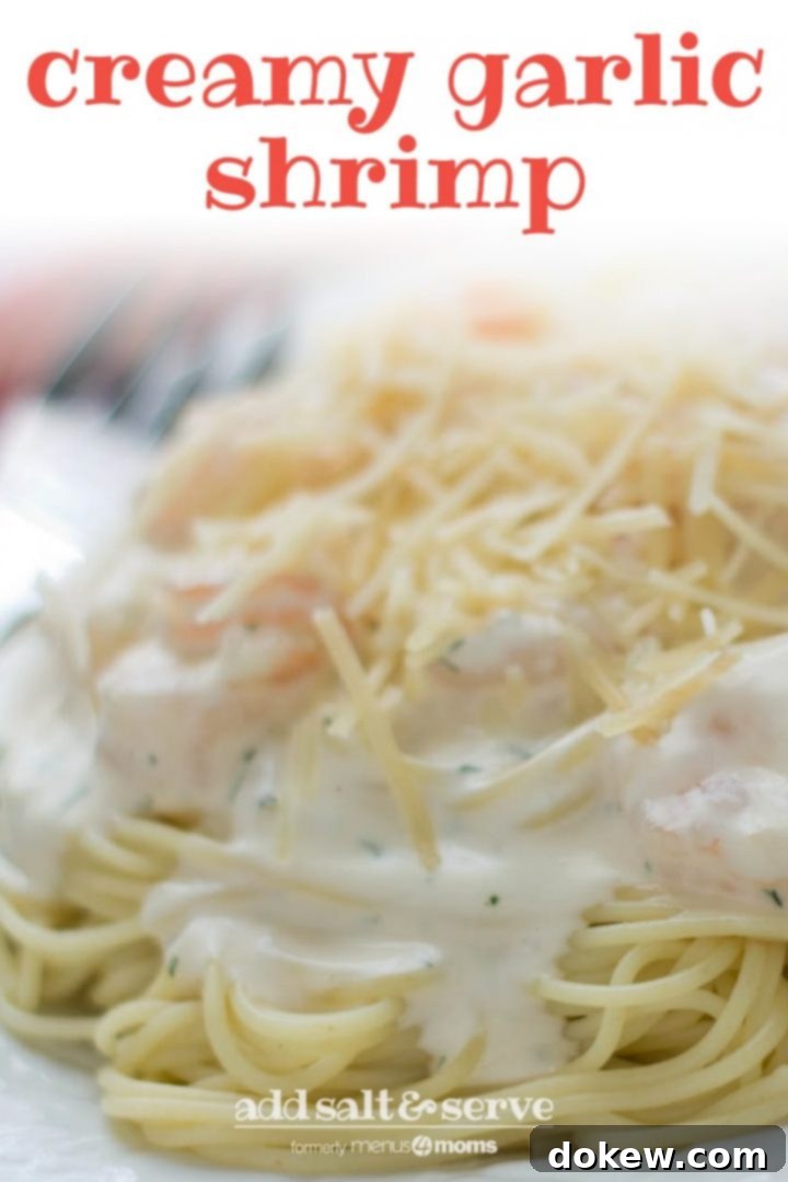 Creamy Garlic Shrimp with Angel Hair Pasta Angel hair pasta with alfredo sauce and shrimp, topped with shredded parmesan cheese, on a white plate. Text creamy garlic shrimp add salt & serve formerly menus4moms