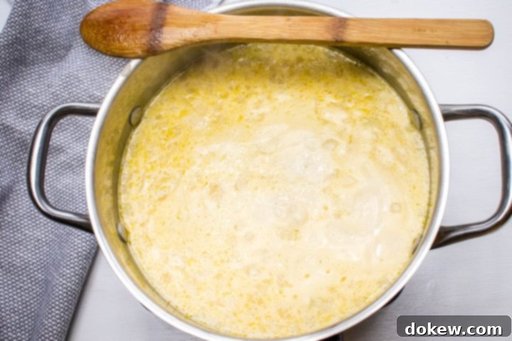 30-Minute Hash Brown Potato Soup 5 Potato soup with hash browns after simmering.