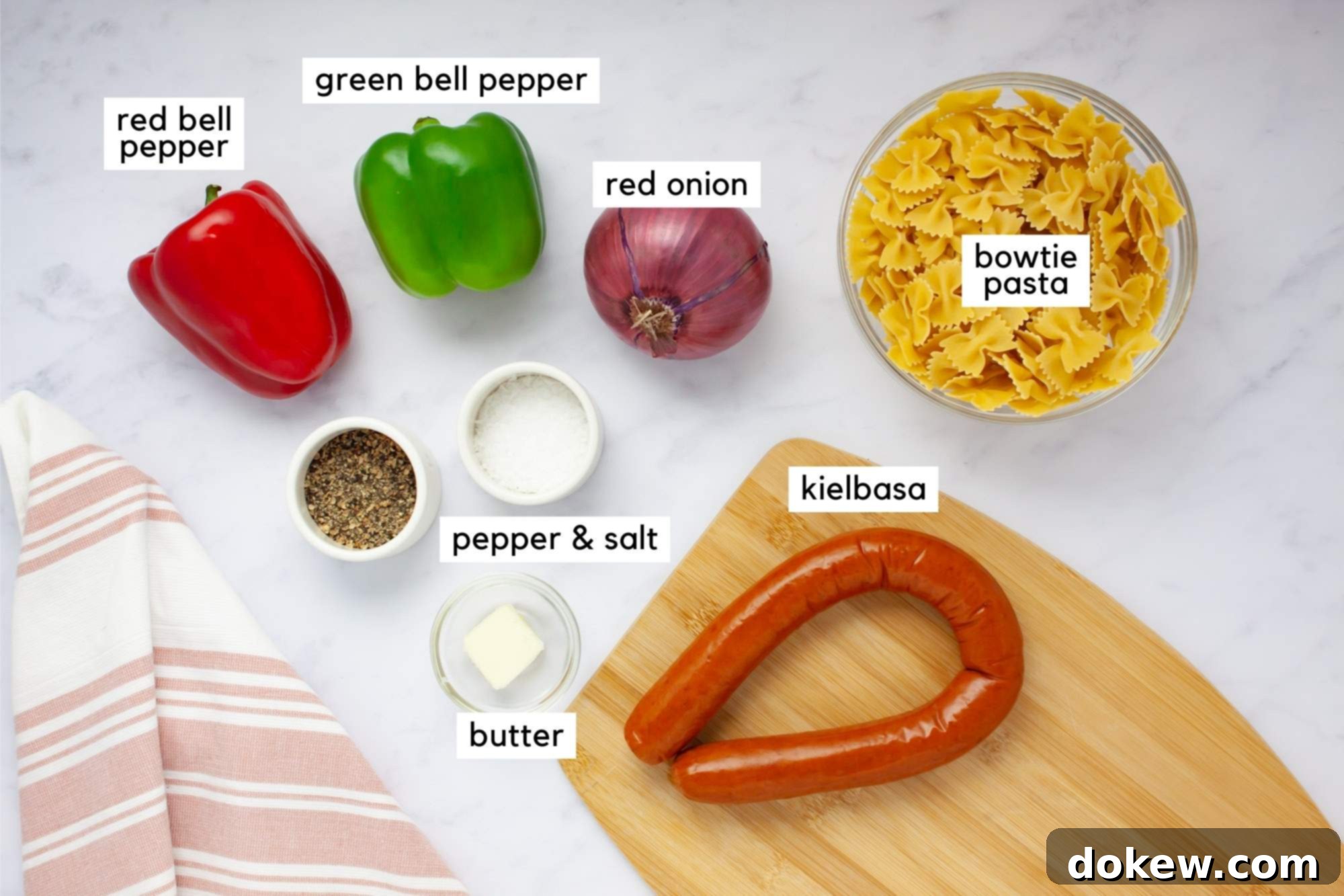 Fast & Flavorful Kielbasa Pepper Pasta 3 Ingredients for Kielbasa Pepper Pasta: bowtie pasta, kielbasa, red pepper, green pepper, red onion, butter, salt, and pepper.