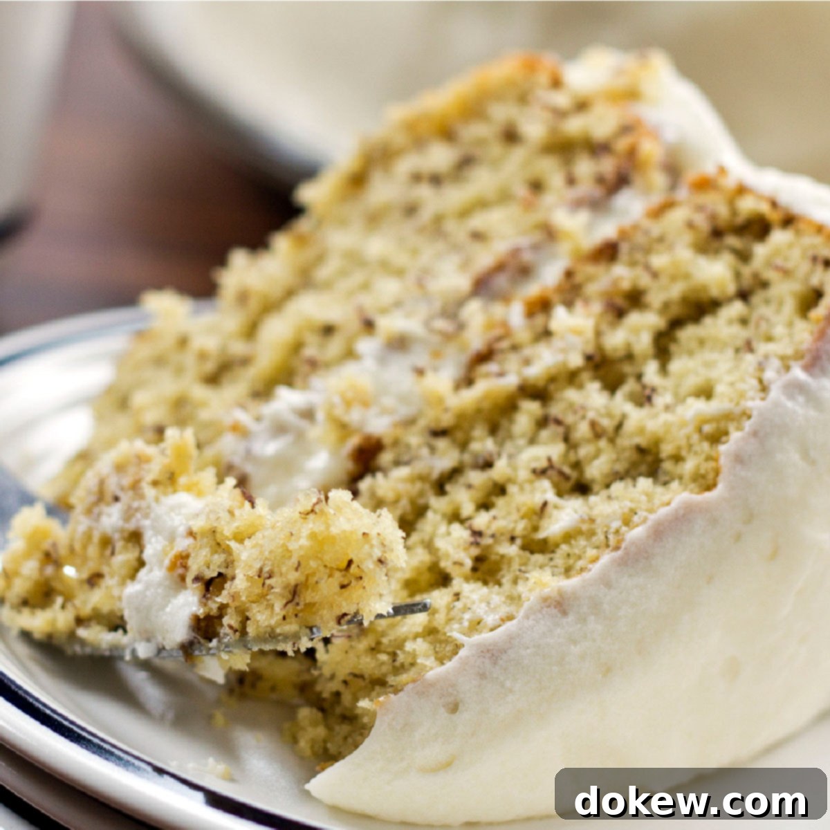 Golden Banana Delight 2 A slice of Banana Cake with Cream Cheese Frosting