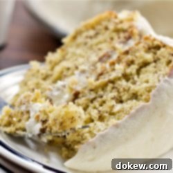 Golden Banana Delight 5 A slice of Banana Cake with Cream Cheese Frosting