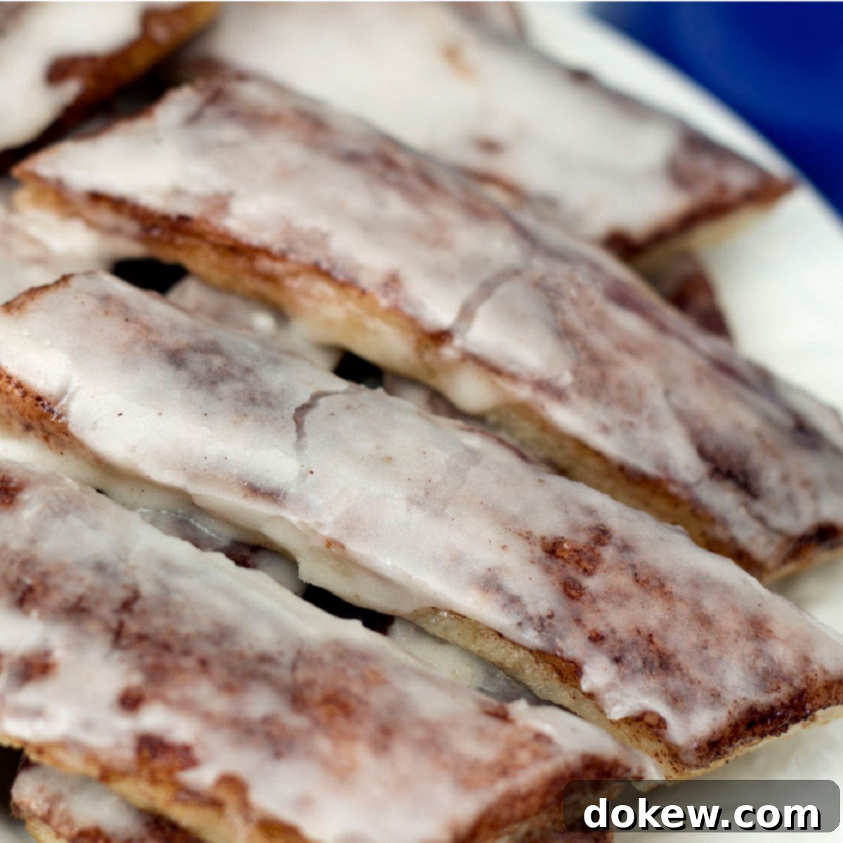 Quick Pizza Dough Cinnamon Twists 2 Warm pizza dough cinnamon sticks piled high with a side of vanilla frosting for dipping.