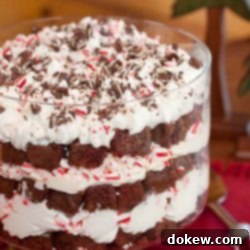 Mint Chocolate Brownie Indulgence 2 Layored peppermint trifle with serving spoon and Christmas decorations