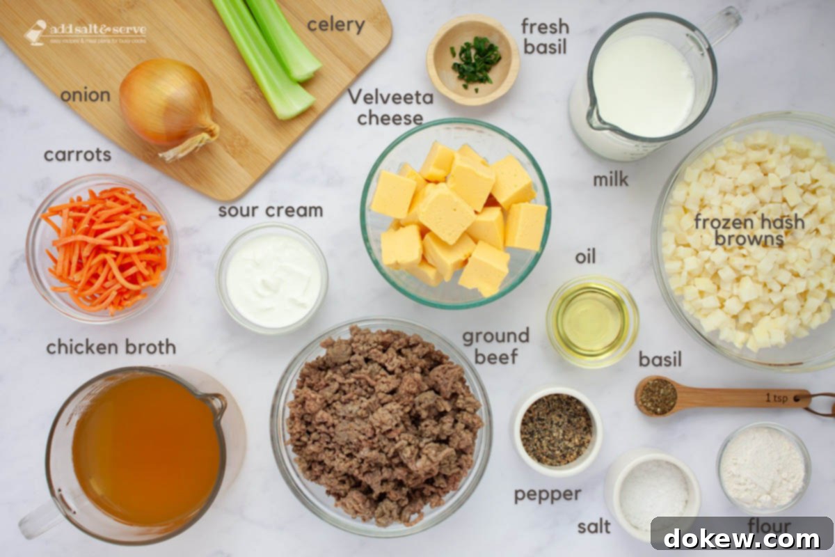 Creamy Crockpot Cheeseburger Soup 3 Ingredients for Cheeseburger Soup: onion, celery, shredded carrots, chicken broth, ground, beef, sour cream, Velveeta cheese, fresh basiil strips, milk, oil, frozen hash browns, cooking oil, dried basil, flour, salt, and pepper.