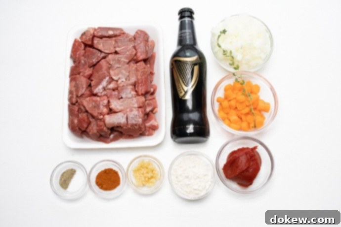 Beef and Guinness Stew Ingredients: Beef stew meat, a bottle of guinness beer, chopped onion, chopped carrot, tomato paste, flour, minced garlic, paprika, thyme, salt, and pepper