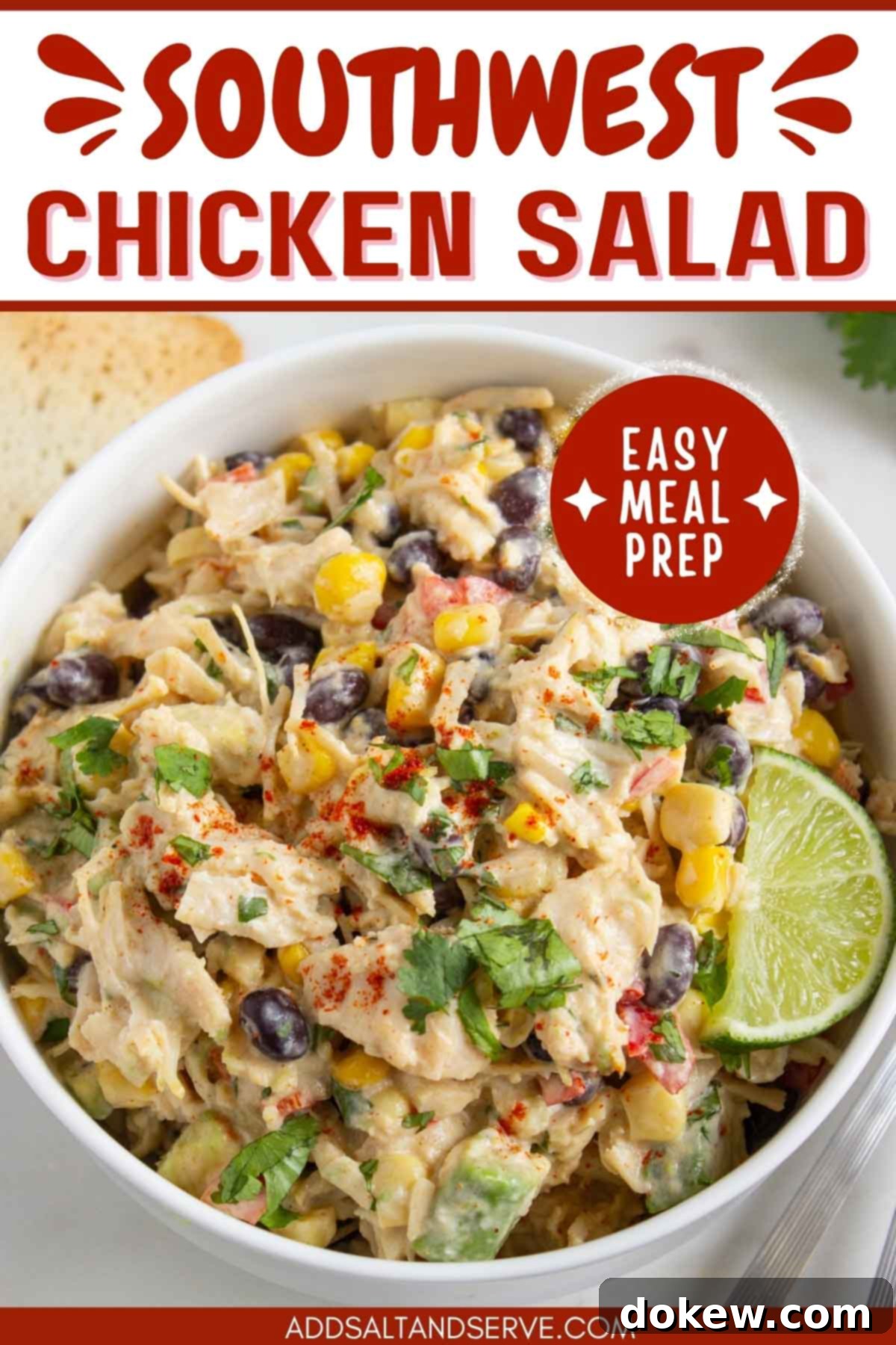 Lime-Kissed Southwest Chicken and Black Bean Salad 6 Bowl of chicken salad with corn, black beans, avocado, and red bell pepper in a creamy dressing garnished with a lime wedge and sprinkled with paprika with text Southwest Chicken Salad - easy meal prep.