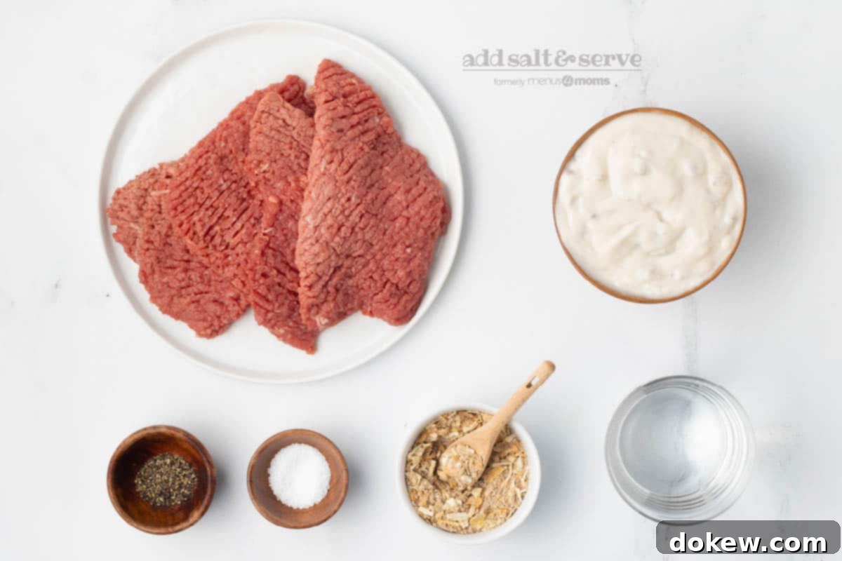Crock Pot Cube Steak with Creamy Mushroom Sauce 3 All the ingredients laid out for making slow cooker cube steak and mushroom soup: cube steak, Lipton onion soup mix, condensed cream of mushroom soup, salt, pepper, and water.