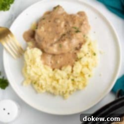 Crock Pot Cube Steak with Creamy Mushroom Sauce 9 Cube steak with mushroom soup gravy served over mashed potatoes.