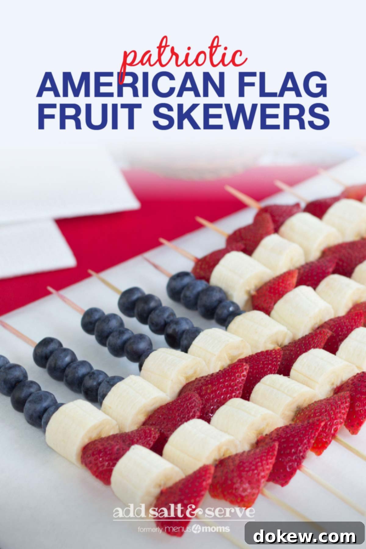 Red, White, and Blue Fruit Delights 4 Blueberries, strawberries, and bananas threaded on bamboo skewers in the design of an American flag