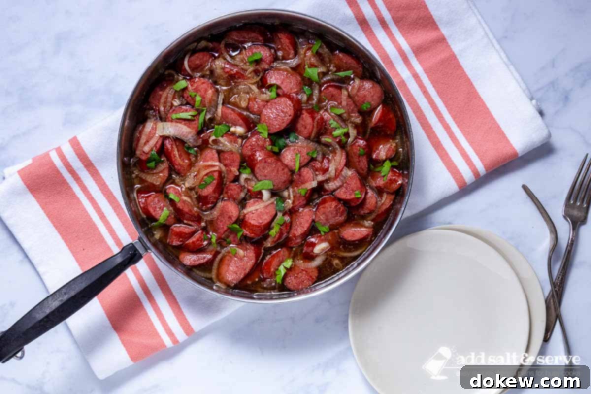 Caramelized Brown Sugar Kielbasa Skillet 7 Cooked brown sugar kielbasa in a skillet.