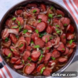 Caramelized Brown Sugar Kielbasa Skillet 8 Cooked brown sugar kielbasa in a skillet.