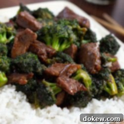 Repurposed Steak and Broccoli Stirfry 7 Easy Beef and Broccoli Stir Fry with Leftover Steak served over rice with chopsticks