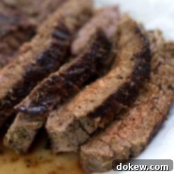 Tuscan Herb Flank Steak 3 Seasoned and grilled flank steak sliced and plated with juices
