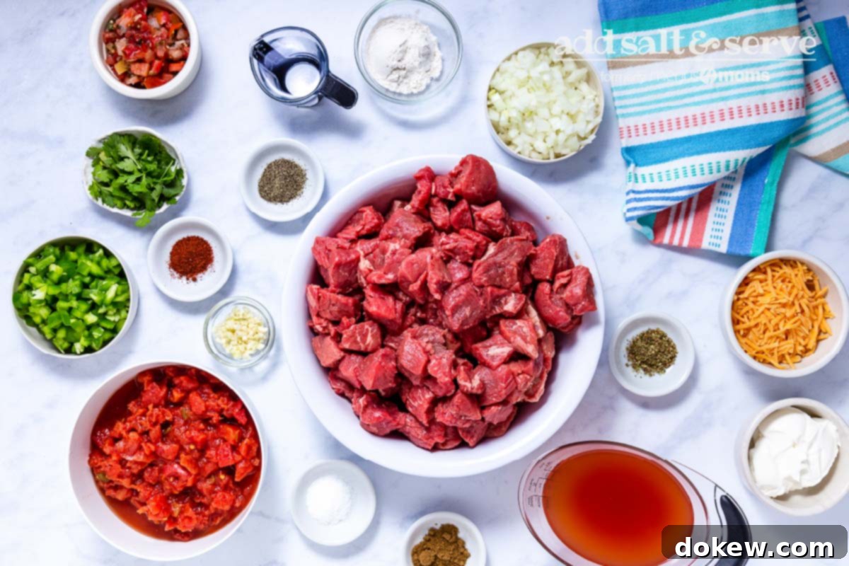 Slow Cooker Tender Beef Guisada 2 Overhead view of ingredients for Carne Guisada Crock Pot.