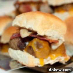Smoky Meatball Sliders 3 Hawaiian roll with meatballs, melted cheddar cheese, bacon, and sautéed onions