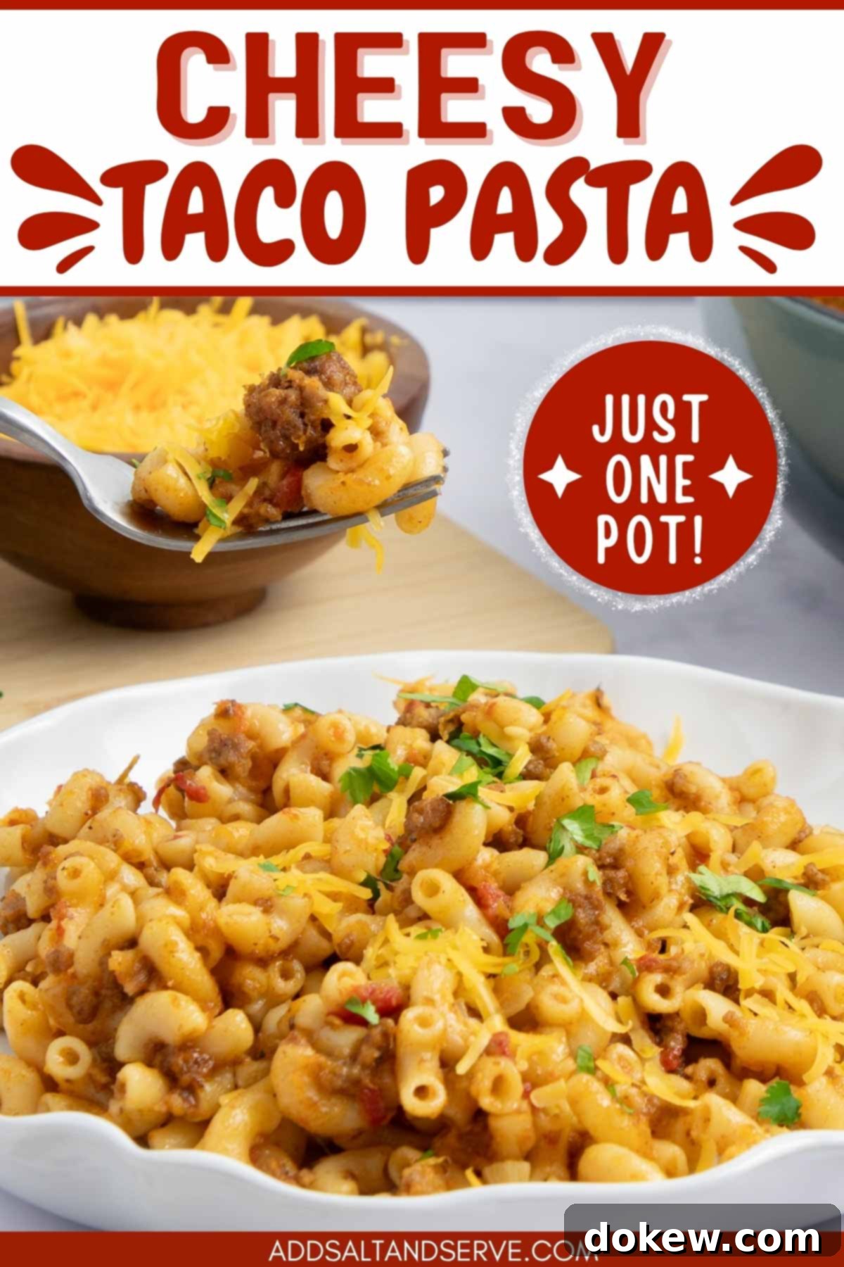 One Pot Taco Macaroni in 30 Minutes 13 Plate of macaroni, beef, and tomatoes in a cheesy sauce garnished with cilantro and grated cheddar cheese with text Cheesy Taco Pasta - Just One Pot.