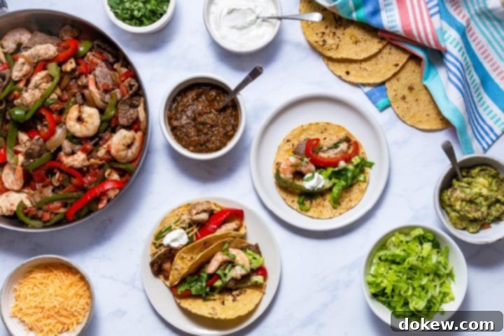 Tex-Mex Fajitas 4 Prepared Fajitas Texanas, a colorful platter of beef, chicken, and shrimp with sautéed peppers and onions, served with an assortment of fresh toppings and warm tortillas.
