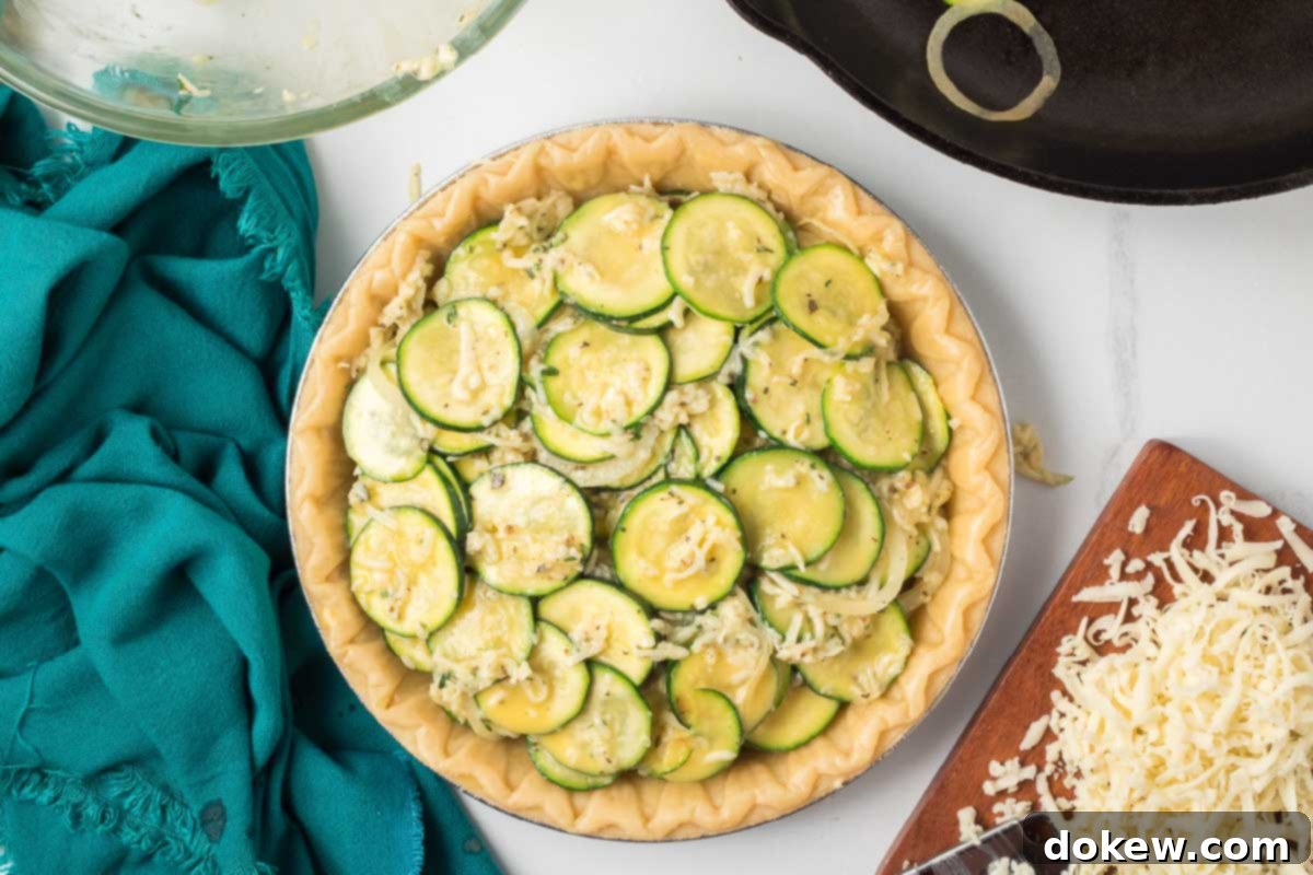 Golden Cheesy Zucchini Quiche 6 Sautéed zucchini and onion mixed with herbs and egg in a pie crust.